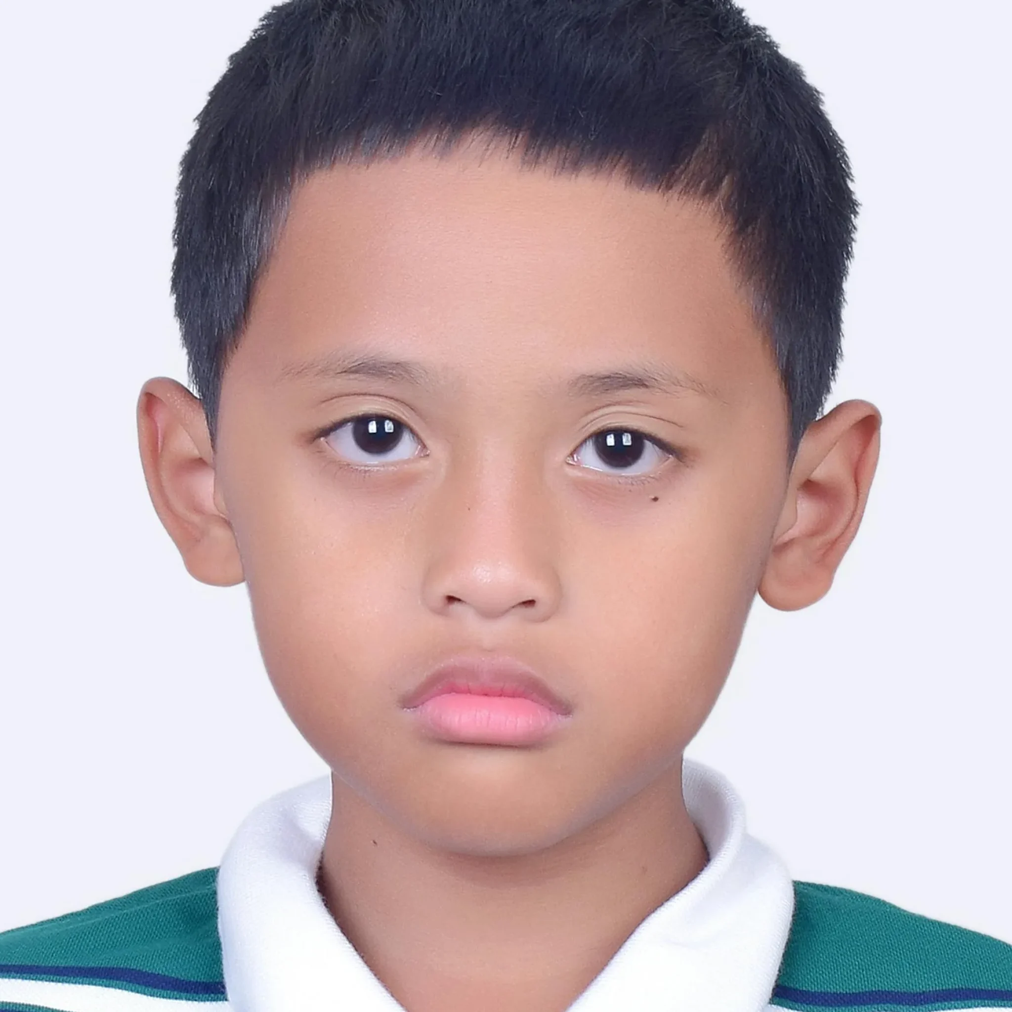 Professional passport photo with a plain white background for official identification documents.